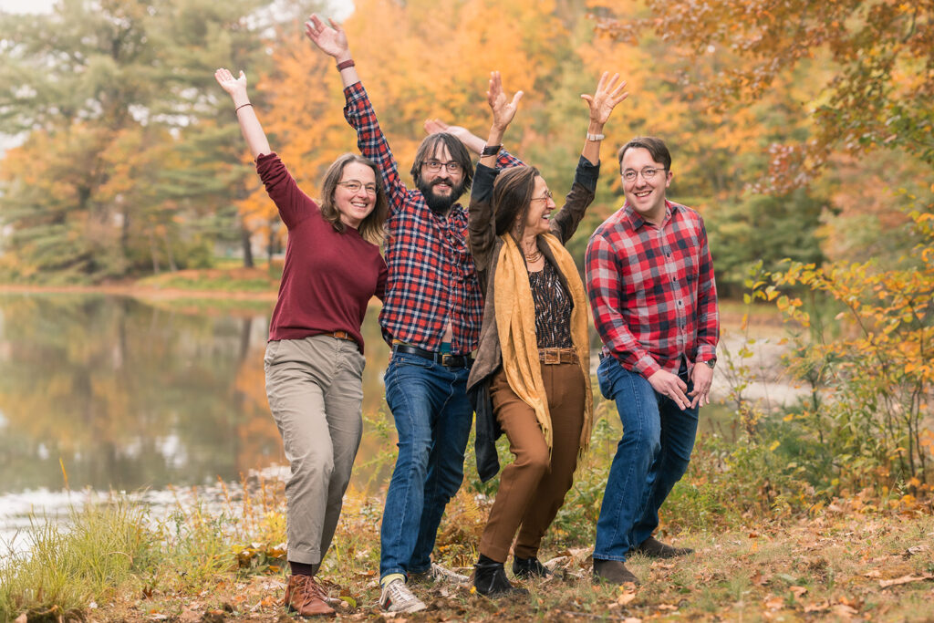Grandmother and three adult children having fun during an extended family photo session in Lincoln, MA