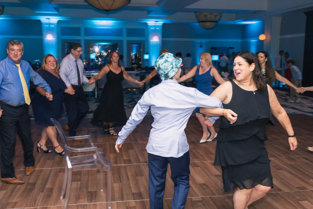 Mom spinning on the dance floor at bar mitzvah reception