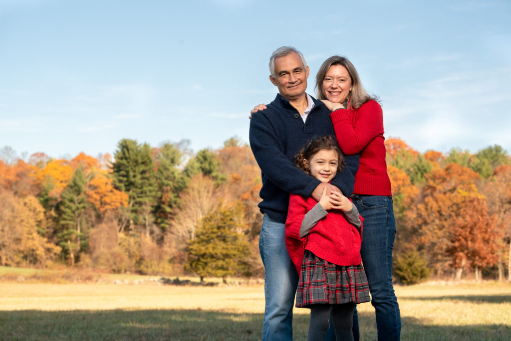 family wearing red and blue for family photo session