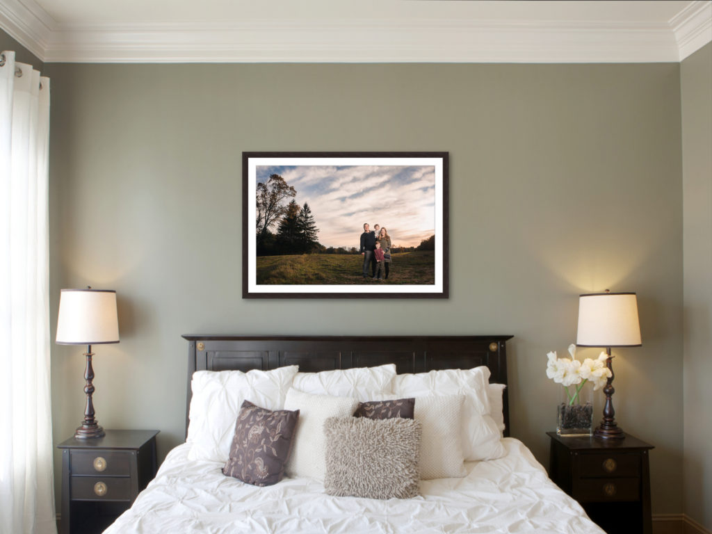 Example of how to display family photos in a bedroom. 